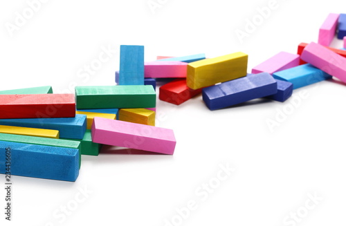 Wooden colorful building blocks for children, tower games isolated on white background