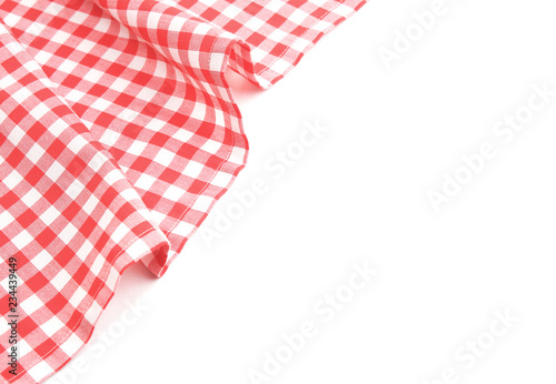 Red checked picnic cloth on white background.