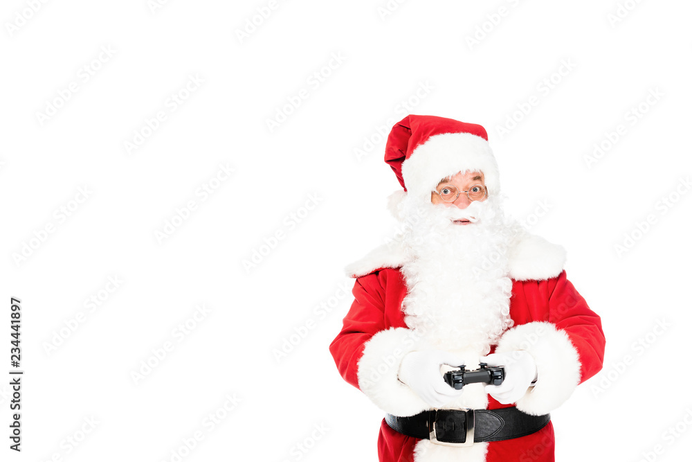santa claus playing video game with gamepad and looking at camera isolated on white santa claus playing video game with gamepad and looking at camera isolated on white