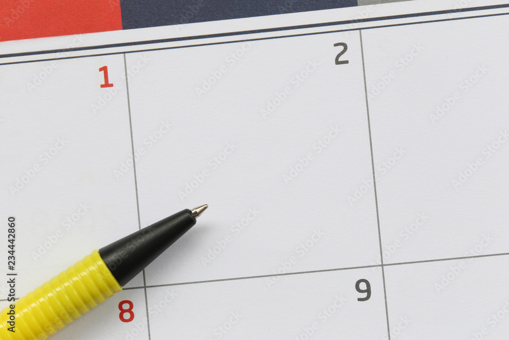 Yellow pen points to a empty area on the calendar background. Yellow pen points to a empty area on the calendar background.