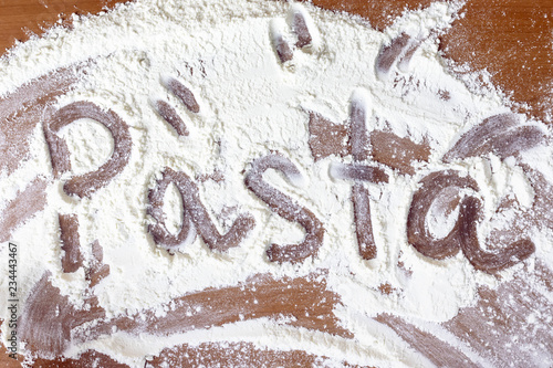 The word pasta written in the flour