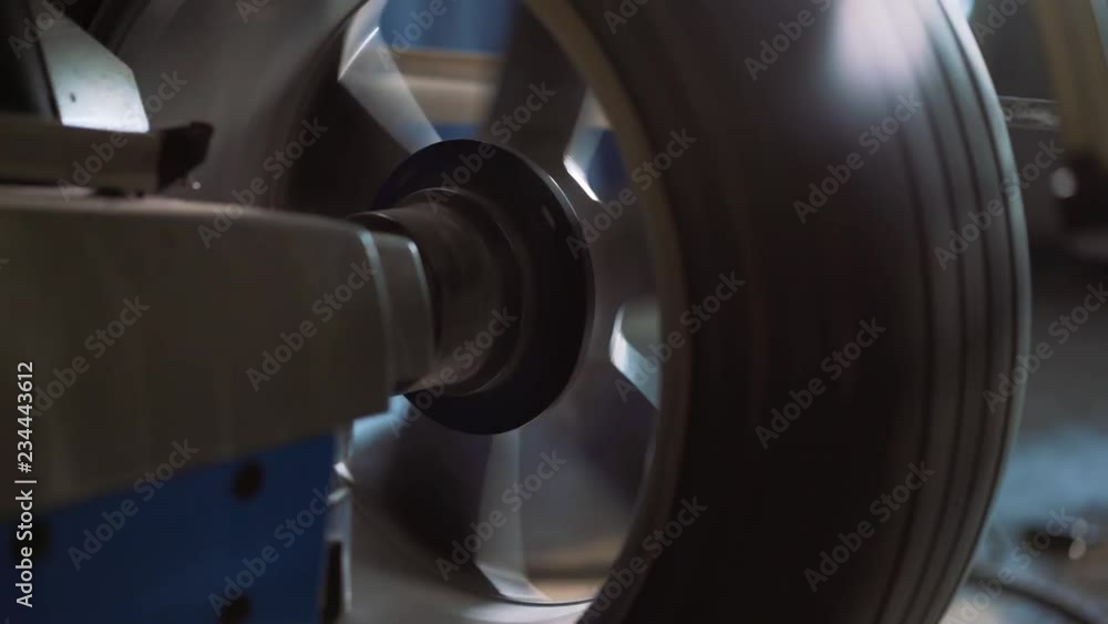Car wheel balancing in tire service. Car wheel balancing in tire service.
