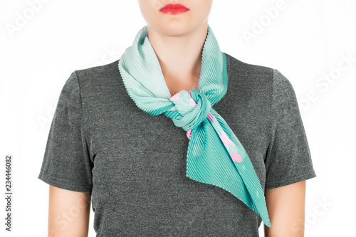 Silk scarf. Green silk scarf around her neck isolated on white background. photo