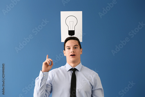 Young businessman and paper...