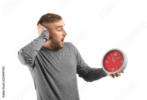 Emotional young man with cl...