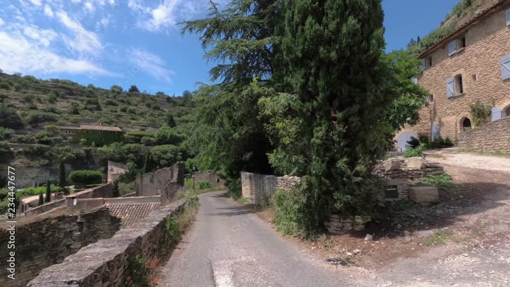 Walking with a video camera in the ancient French town of Gordes. Provence. France. Slow motion. Walking with a video camera in the ancient French town of Gordes. Provence. France. Slow motion.