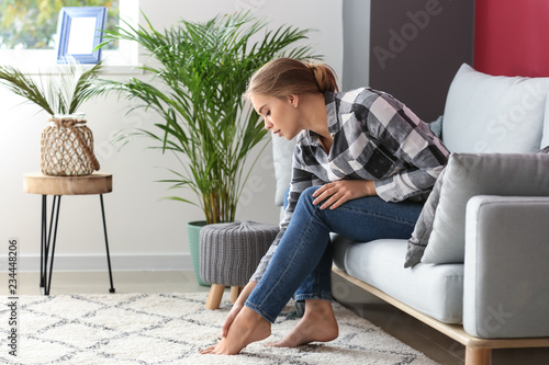 Young woman suffering from ...