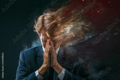Bilde på lerret broken businessman. Stress at work, concept. dark background