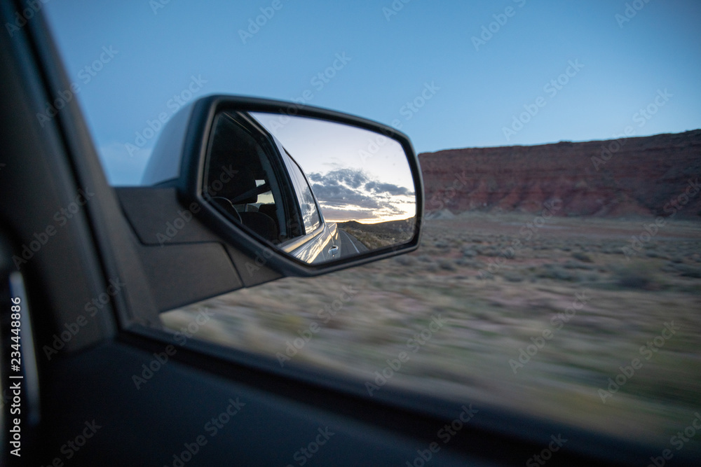 Looking back in the mirror while driving through Utah canyons Looking back in the mirror while driving through Utah canyons