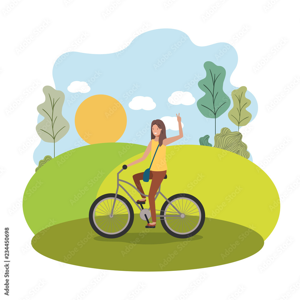 young woman in bicycle on the park young woman in bicycle on the park
