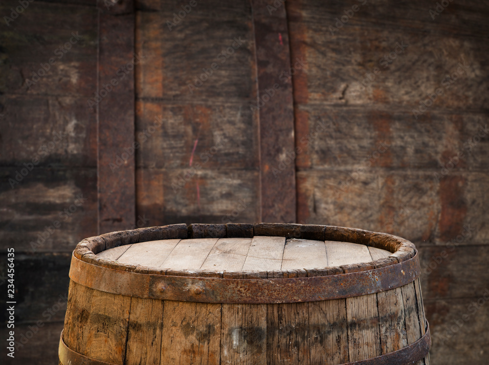 background of barrel and worn old table of wood background of barrel and worn old table of wood