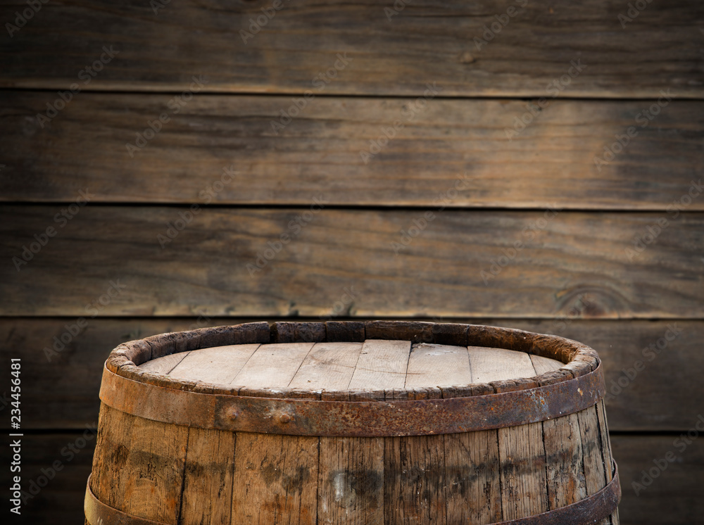 background of barrel and worn old table of wood background of barrel and worn old table of wood
