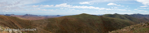 Beautiful panorama of volcanic mountains from the viewpoint Mirador Morro Velosa in Fuerteventura, Canary Islands © kelifamily