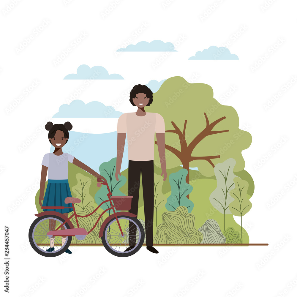 father and daughter with bycicle in landscape