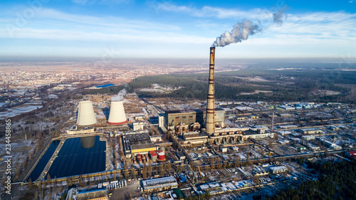 Garbage incineration plant. Waste incinerator plant with smoking smokestack. The problem of environmental pollution by factories