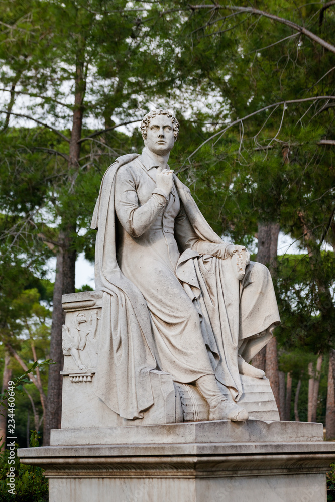 Fototapeta premium Rome, Italy - August 5, 2018: Architectural detail of the statue of Byron in Borghese Gardens in Rome.