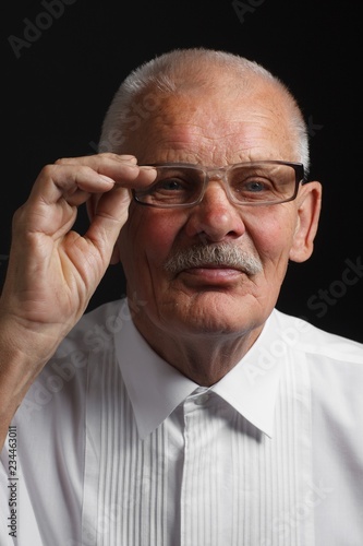 Emotional grandfather in glasses