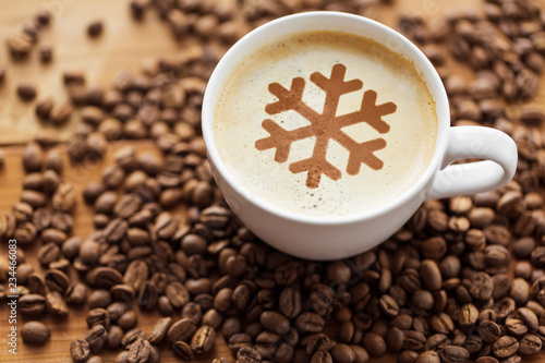 Принти на полотні winter holidays and hot drinks concept - close up coffee cup with snowflake sten