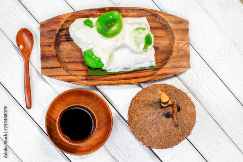 Badak berendam a local Malaysian dessert and cuf of coffee on wooden background