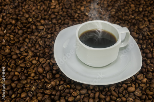 Coffee mug over grain texture