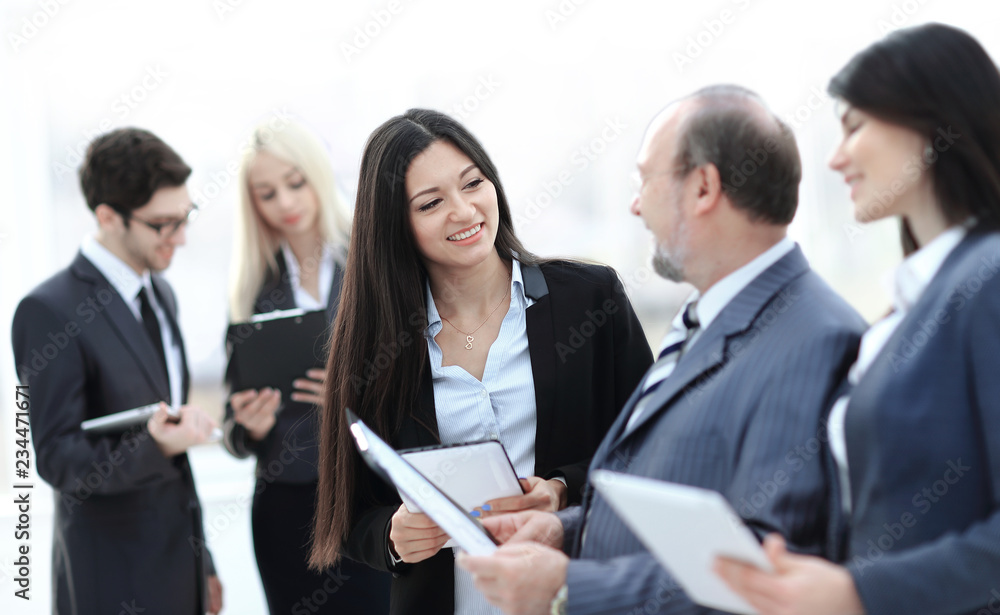 close up.group of business people preparing to start a business meeting close up.group of business people preparing to start a business meeting