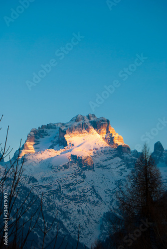 Sunset on the Adamello Brenta with blue sky from Madonna di Campiglio