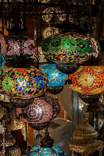 Lamps, lanterns, lamps of multicolored glass mosaic in the street market of the market in Istanbul, Turkey