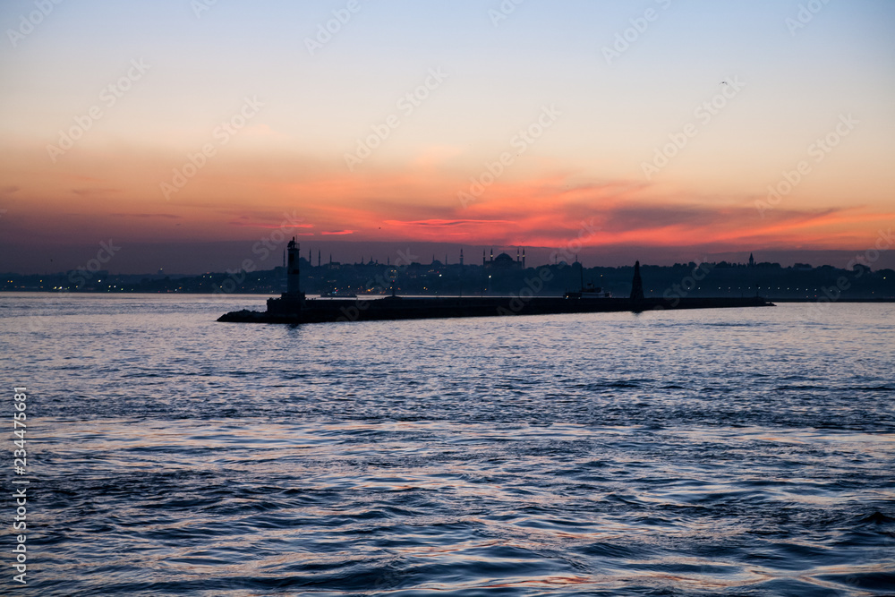 Silhouette of the lighthouse on the sunset on the Bosphorus, Istanbul, Turkey