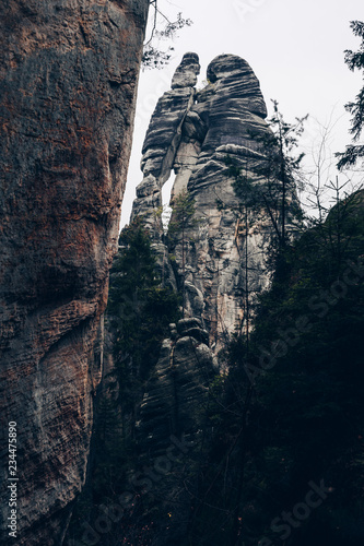 Famous rock formation called Lovers or Milenci in Adrspach sandstone rock city, nothern Bohemia, Czech Republic. Adrspach Sandstone Towers in an autumn colors. photo