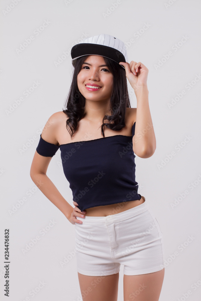 cute happy smiling woman wearing cap. portrait of positive optimistic urban woman with modern fashion, studio white isolated with friendly girl face. young adult beautiful girl asian woman model cute happy smiling woman wearing cap. portrait of positive optimistic urban woman with modern fashion, studio white isolated with friendly girl face. young adult beautiful girl asian woman model