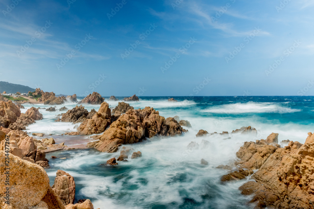 Rocks in a wavy sea