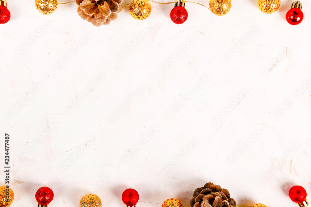 Christmas mood concept. Layout composition with traditional festive attributes, brown decorative fresh pine tree cones. Winter holidays season. Background, copy space, close up, top view, flat lay.