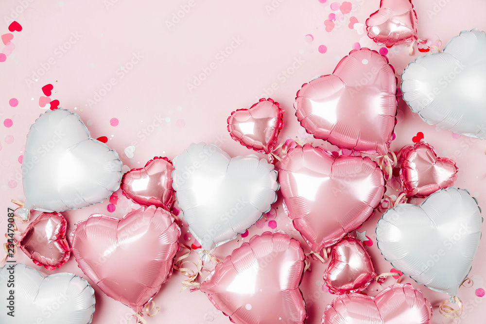 modus referentie schouder Air Balloons of heart shaped foil on pastel pink background. Love concept.  Holiday celebration. Valentine's Day or wedding/bachelorette party  decoration. Metallic balloon Stock Photo | Adobe Stock