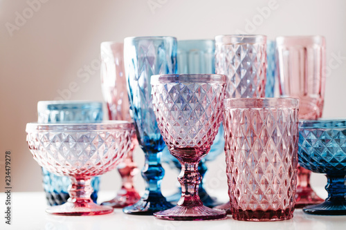 Embossed colored drink glasses for wine and champagne. photo