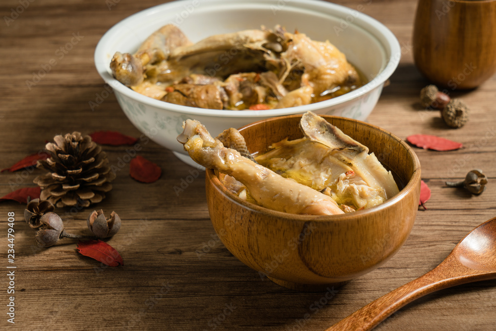 chicken soup with wooden background chicken soup with wooden background