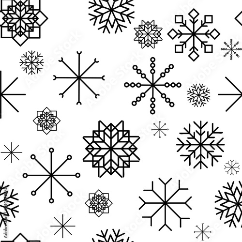 Seamless pattern with hand drawn snowflakes. Abstract brush strokes. Ink illustration. Winter pattern for wrapping paper.