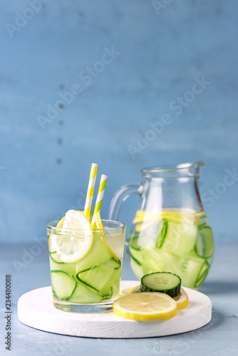 Glass of Detox Infused Water with Cucumber and Lemon Healthy Refreshing Drink vertical