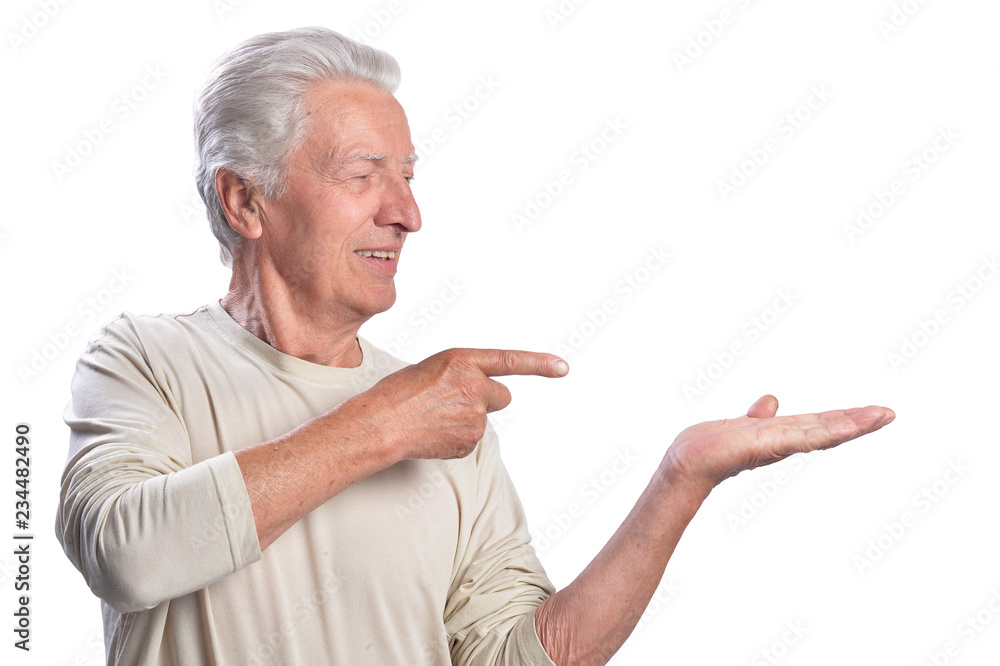 Happy senior man pointing to the right Happy senior man pointing to the right