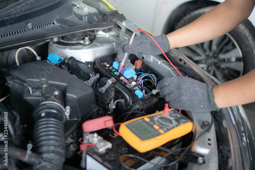 Car repair and maintenance. Performing engine diagnostics