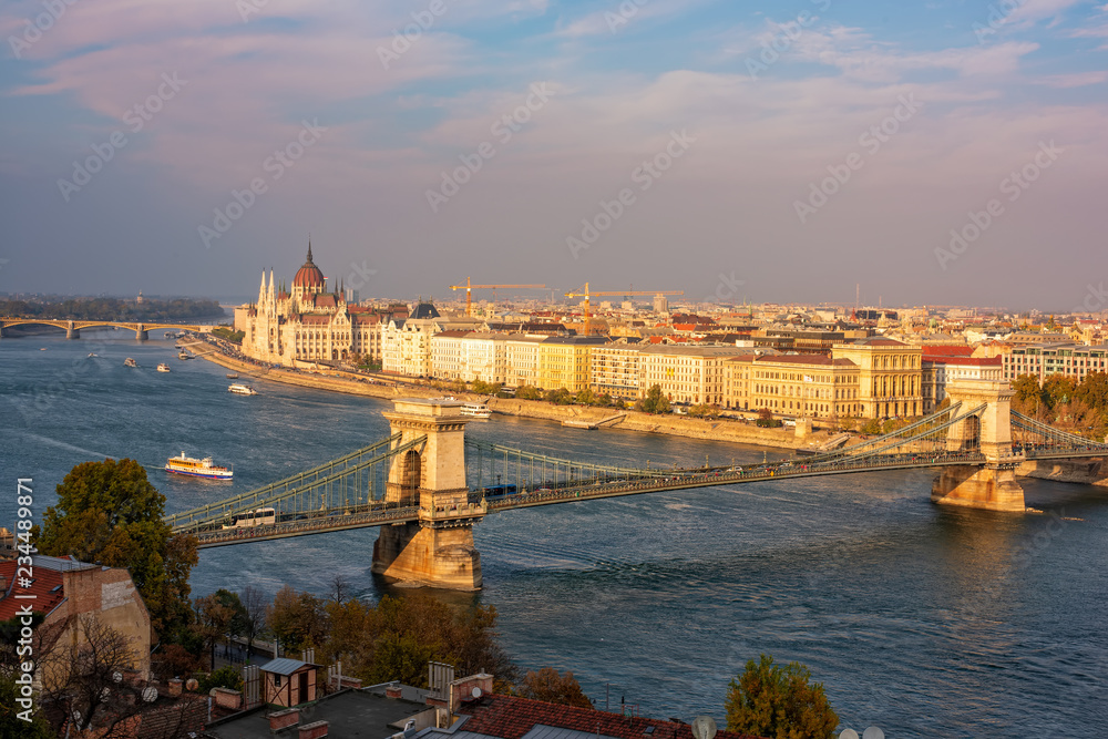 Amazing panoramic view of Budapest from Castle Hill with Danube river, Chain Bridge and Parliament Building at sunset, Budapest, Hungary