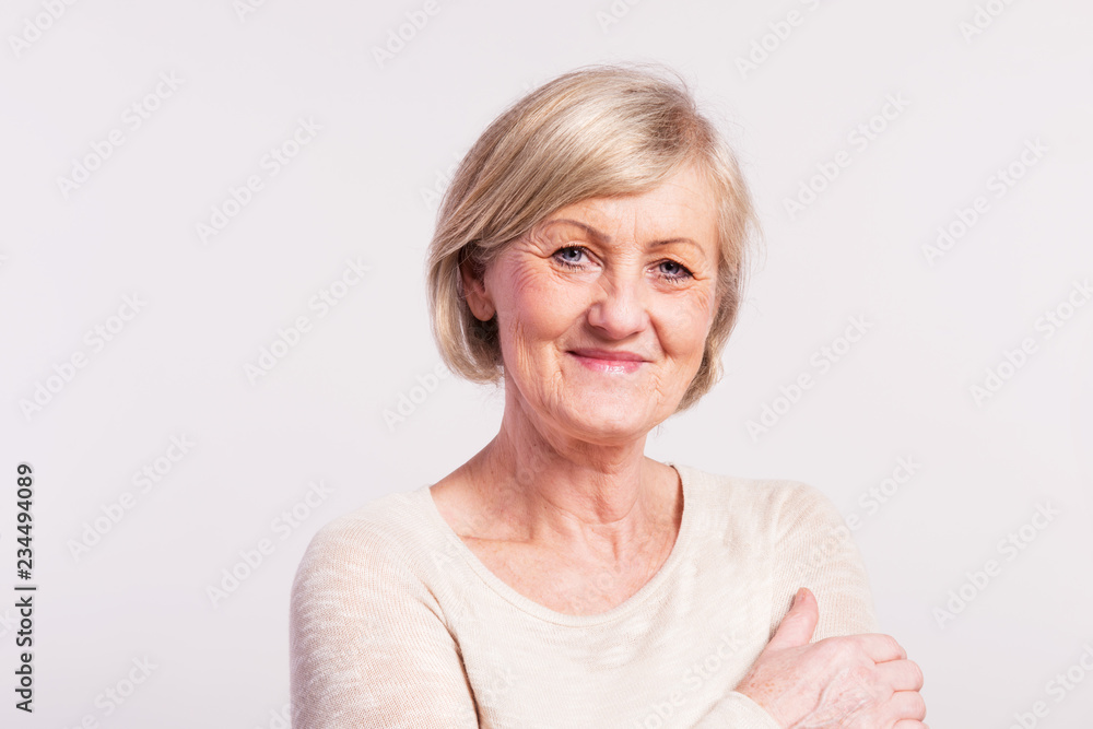 Portrait of a senior woman in studio. Portrait of a senior woman in studio.
