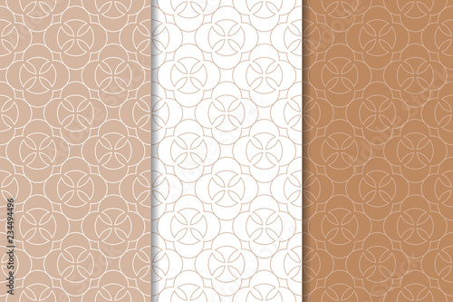Brown and white set of geometric seamless patterns