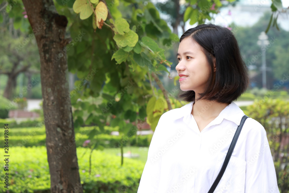 portrait of young woman at a park in Vietnam portrait of young woman at a park in Vietnam