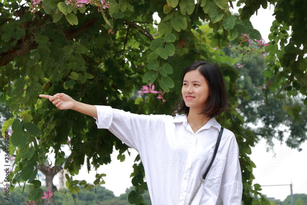 portrait of young woman at a park in Vietnam portrait of young woman at a park in Vietnam