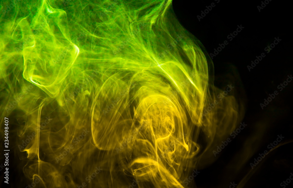 Obraz premium Colored smoke on black background