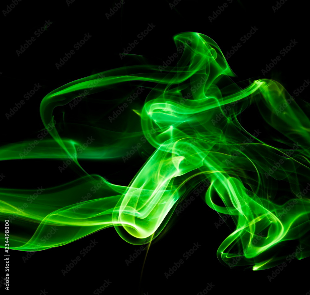 Green smoke on black background Green smoke on black background