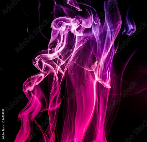 Colored smoke on black background