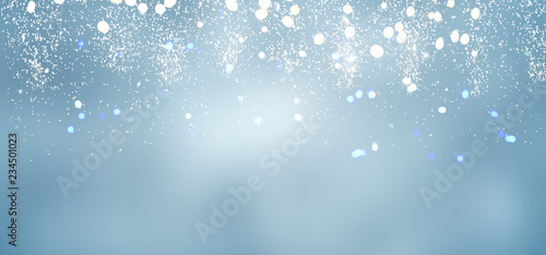 Fototapeta Naklejka Na Ścianę i Meble -  christmas lights bokeh defocused light blue background banner