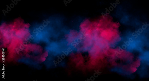 Multicolored smoke on a dark background.  © MiaStendal