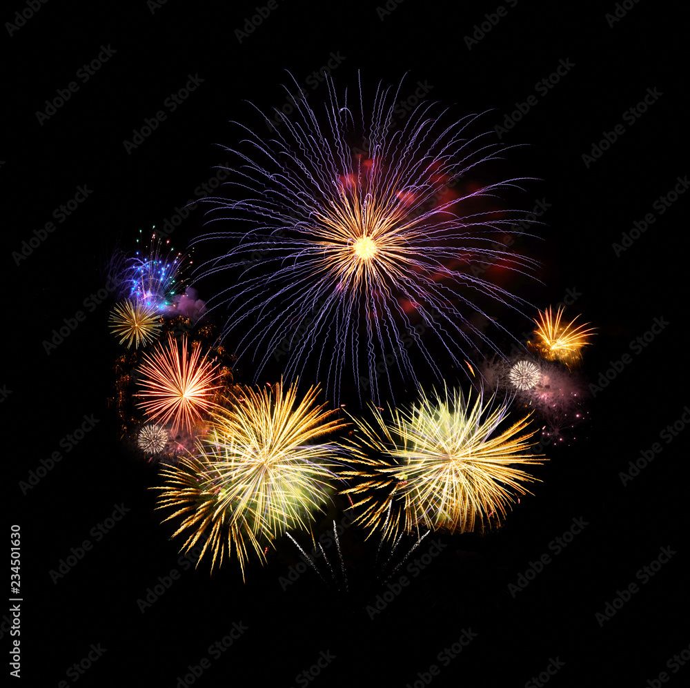 Fireworks abstract colorful explosions isolated on black, festival and celebration concept